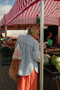 Kaboompics - Woman Shopping for Vegetables at a Farmers Market