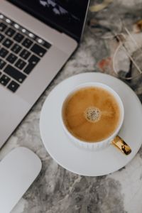 Coffee in a cup on a marble desk