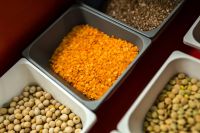 Kaboompics - Close-Up of Red Lentils and Chickpeas in Bulk Food Bins