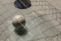 Kaboompics - Modern Geometric Background with Wire Mesh and White Sphere
