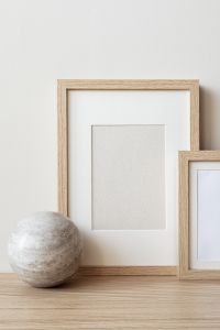 Kaboompics - Landscape Picture Frame Mockup on Neutral Sofa Cushion for Interior Design