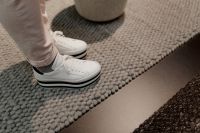 Kaboompics - A woman in white flatform sneakers