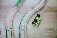 Kaboompics - Wooden car toys on the floor