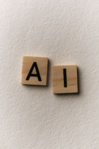 Kaboompics - Wooden Letter Tiles A and I on White Background