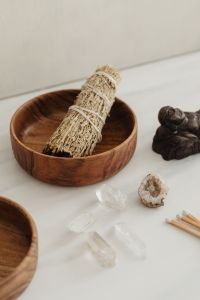 Kaboompics - Minimal Sage Bundle In Wooden Bowl With Buddha And Crystals
