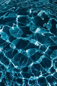 Kaboompics - Wavy water surface in a swimming pool