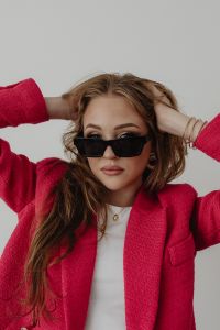 Kaboompics - Woman Posing in a Bright Pink Suit