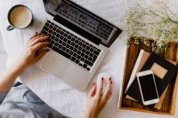 Kaboompics - Overhead Home Office Workspace with Laptop, Coffee, Smartphone and Books on a Wooden Tray