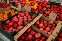 Kaboompics - Colorful Tomato and Pepper Display at a Farmers Market