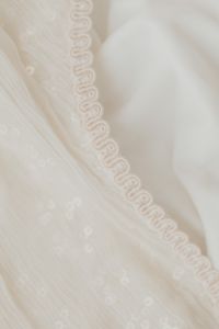 Kaboompics - White Scalloped Lace Trim on Fabric