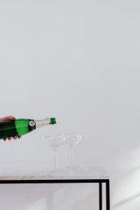 Kaboompics - Two Champagne Glasses on Marble With Light and Shadow
