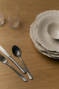 Kaboompics - Vertical Dining Table Setting with White Ceramic Plates, Ribbed Glasses and Cutlery