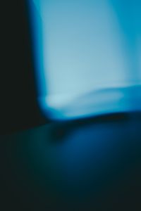 Kaboompics - Dark Cyan Blurred Light Phone Wallpaper