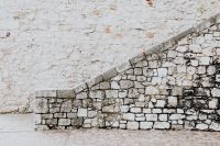 Kaboompics - Aged Limestone Wall and Stone Steps in Krakow, Poland