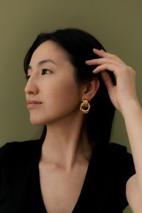 Kaboompics - Close Up of Gold Hoop Earrings on Woman