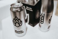 Kaboompics - Silver Beverage Can and Bottle with Minimal Product Packaging