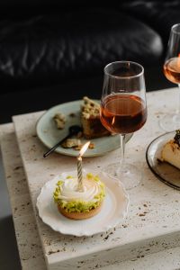 Kaboompics - White Cake, Desserts and Wine Glasses on a Table