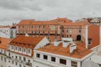 Kaboompics - Dense Terracotta Roofscape and White Historic Apartments in Lisbon