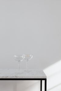 Kaboompics - Minimal Champagne Toast Setup in Bright Interior