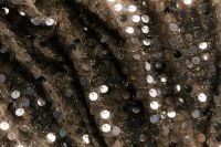 Kaboompics - Silver Sequin Fabric with Dark Folds