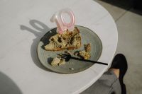 Kaboompics - Top View of Cake Slice and Pink Number Candle