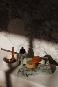 Kaboompics - Natural Spa Products with Soap Bars, Sea Sponge and Frosted Dropper Bottle