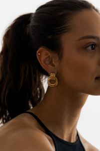 Kaboompics - Side Profile of Woman Wearing Gold Hoop Earring