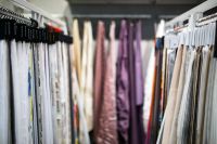 Kaboompics - Collection of design fabrics on hangers