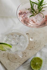 Kaboompics - Pink Rosemary Cocktail and Clear Lime Drink