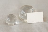 Kaboompics - Blank Horizontal Card Beside a Glass Sphere on Beige Linen