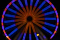 Kaboompics - Ferris Wheel with Amber Spokes and Blue Rim Lights
