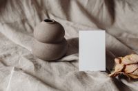 Kaboompics - Landscape Business Card with Dried Rose on a Ceramic Plate