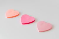 Kaboompics - Three Pastel Heart Cutouts on White Background
