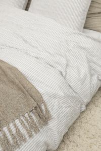 Kaboompics - Close-Up Checkered Bedding and Beige Throw