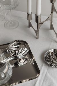 Kaboompics - Silver Tray, Spoons and Jewelry beside Chrome Candelabra