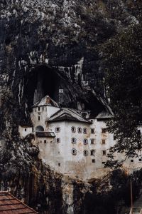 Kaboompics - Predjama castle at the cave mouth in Postojna, Slovenia