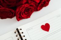 Kaboompics - Valentine's Day Planner Page with Felt Heart and Red Rose Bouquet, February Calendar