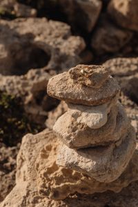 Kaboompics - Gold Ring on Stacked Limestone Rocks at the Coast