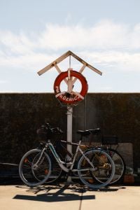 Kaboompics - Harbor Lifebuoy With Parked Bicycles