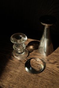 Kaboompics - Moody Still Life with Glass Candle Holder and Silver Vase