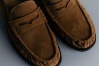 Kaboompics - Brown Suede Loafers in Front-Facing Product Composition