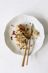 Kaboompics - Overhead Polish Meat Dumplings on White Background with Menu Copy Space