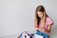 Kaboompics - Math Homework with Calculator and School Backpack