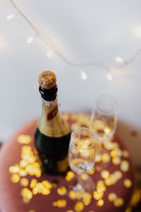 Kaboompics - Close Up Champagne Bottle And Glasses With Golden Bokeh