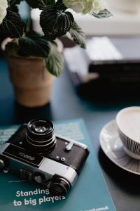 Old analog camera and photography book