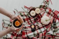 Kaboompics - Orange Tea With Pumpkins and Candle on Plaid Blanket