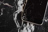 Kaboompics - Broken Mobile on Marble Table