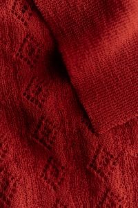 Kaboompics - Red Knitted Collar With Textured Fabric Detail