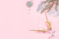 Kaboompics - Aesthetic Pink New Years Wallpaper with Gold Lettering