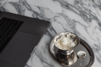 Kaboompics - Laptop and Silver Dessert Bowl on a Chrome Tray with Spoon, Minimal Home Office Still Life